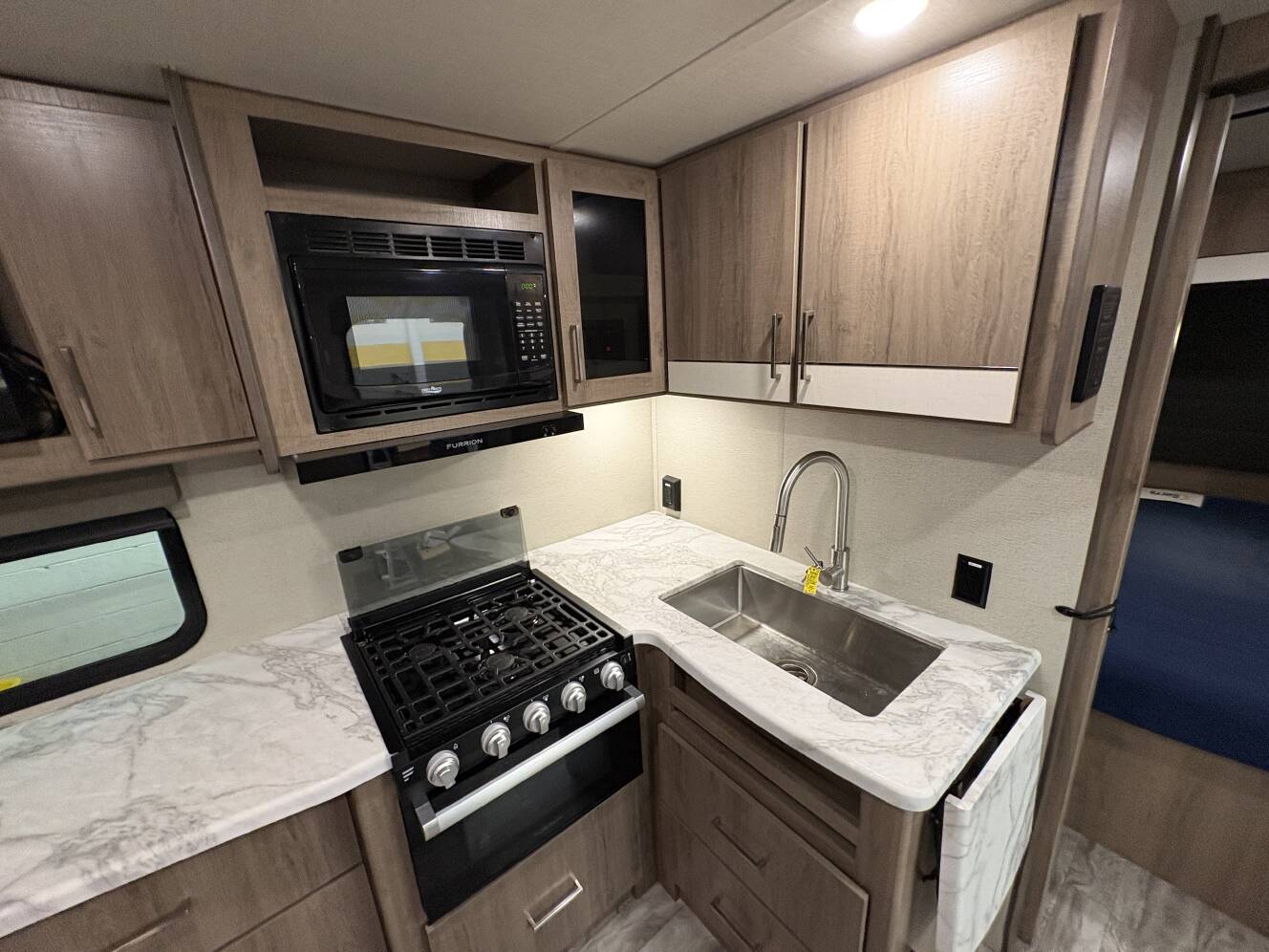 A photo of this 2022 Grand Design Imagine XLS 22RBE