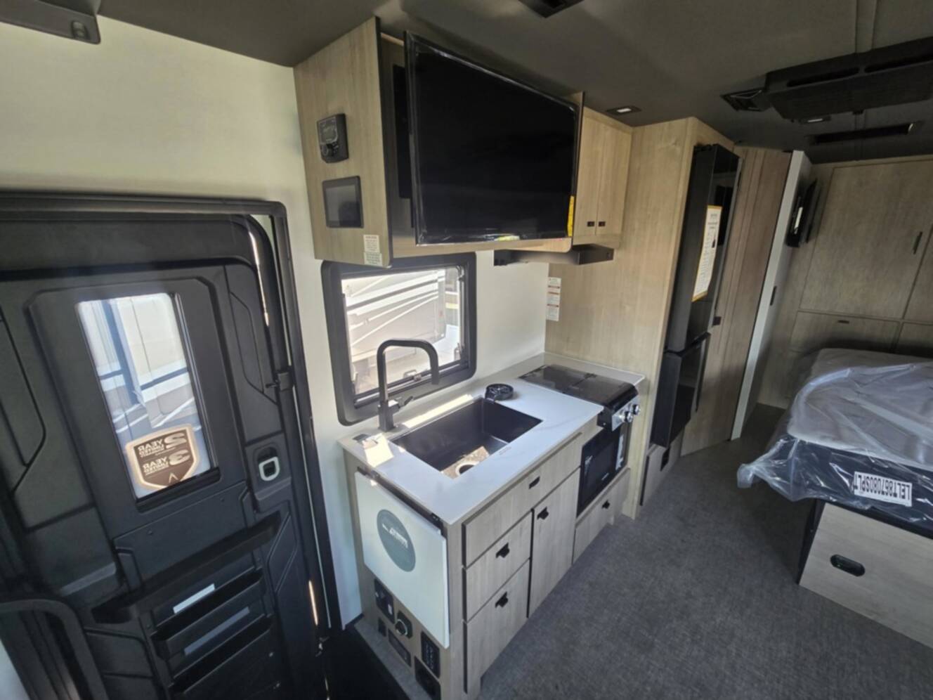 A photo of this 2027 Grand Design Lineage Series M 25FW
