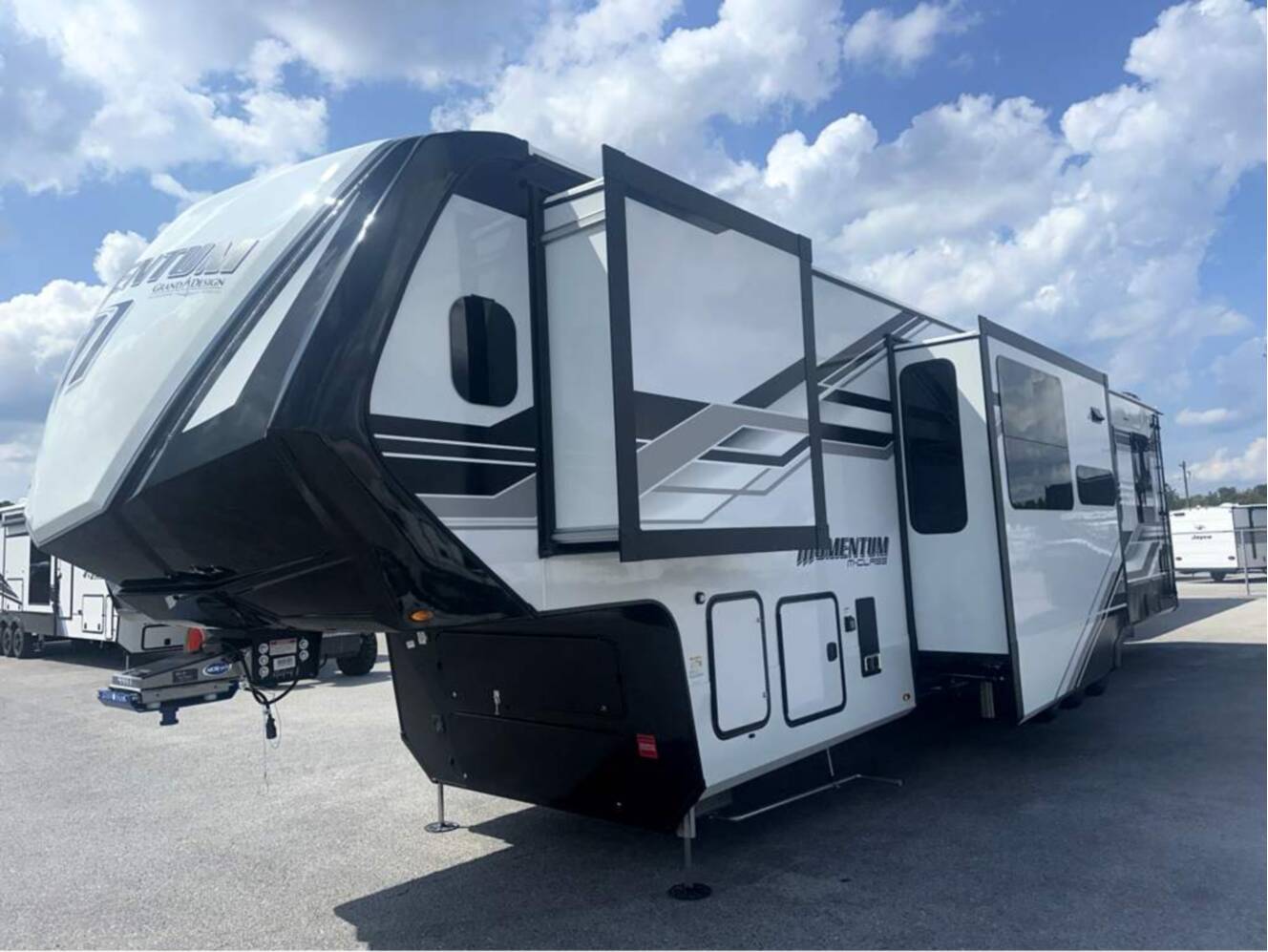 A photo of this 2026 Grand Design Momentum M-Class 392M
