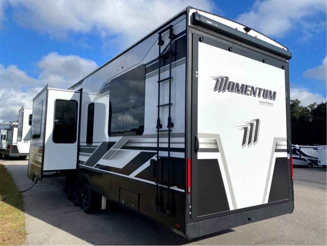 A photo of this 2026 Grand Design Momentum M-Class 414M