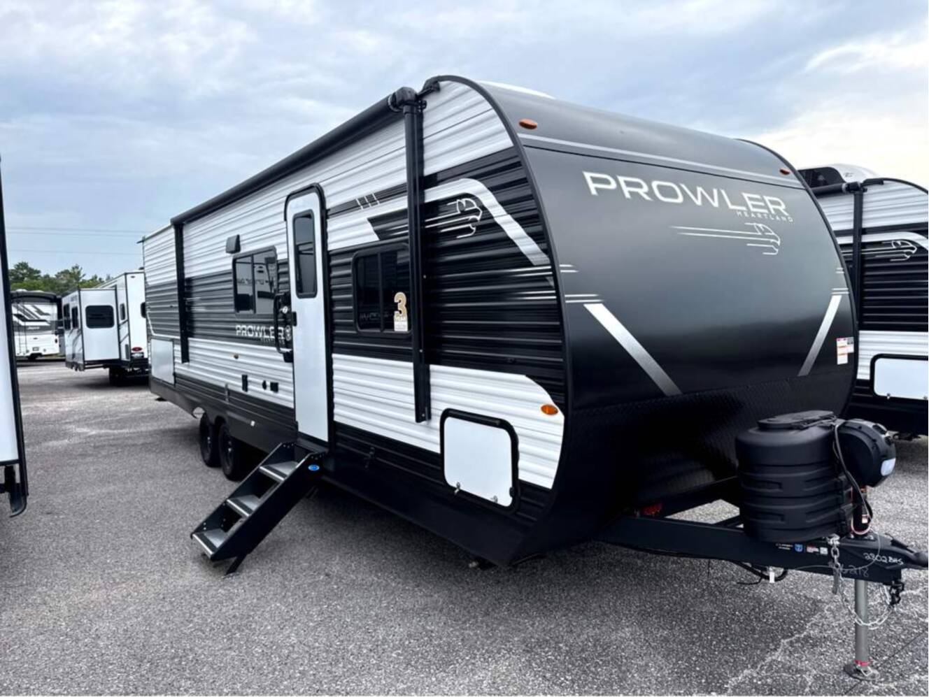 A photo of this 2027 Heartland Prowler 2802BHS