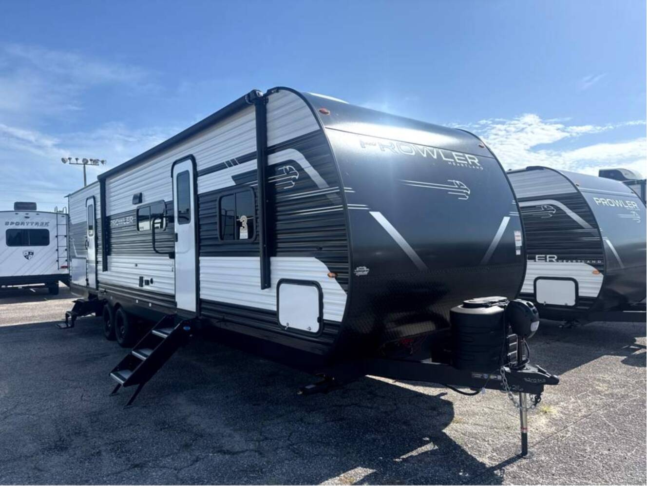 A photo of this 2027 Heartland Prowler 3202DSB