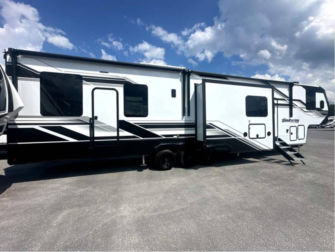 A photo of this 2026 Grand Design Momentum M-Class 392M