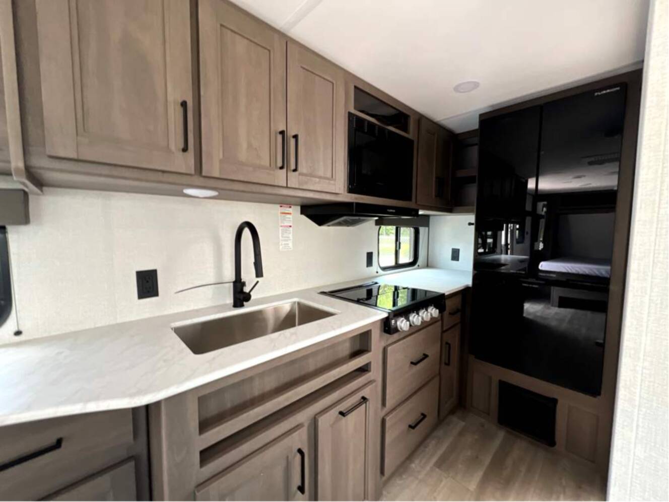 A photo of this 2026 Grand Design Transcend XPLOR 20MKX