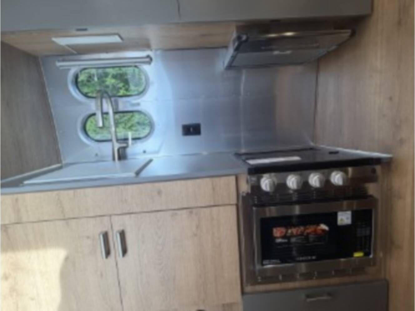 A photo of this 2026 Airstream Trade Wind 23FBT