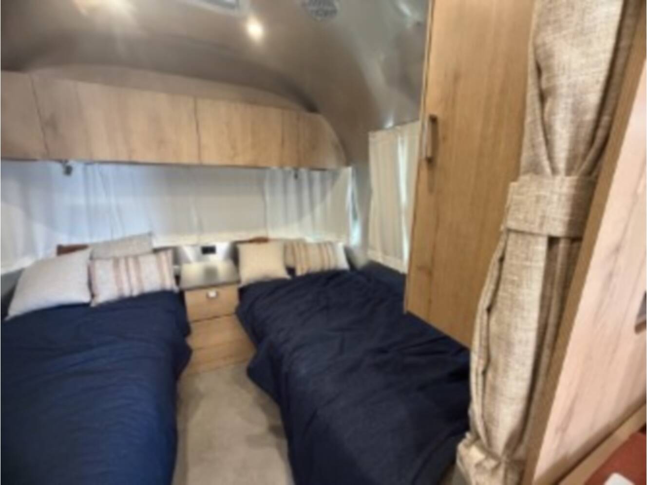 A photo of this 2026 Airstream Trade Wind 23FBT