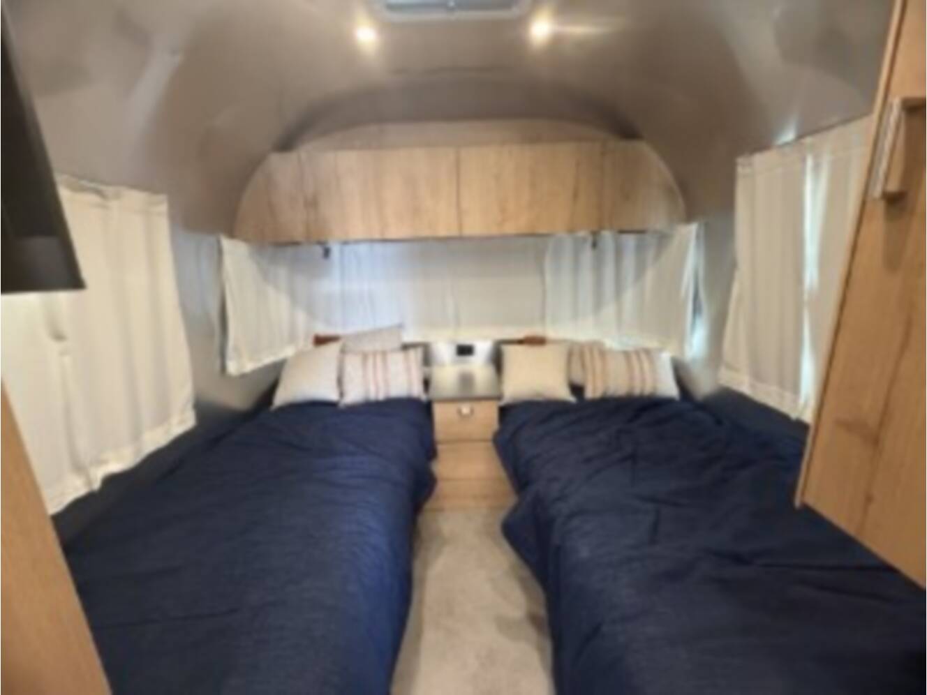 A photo of this 2026 Airstream Trade Wind 23FBT