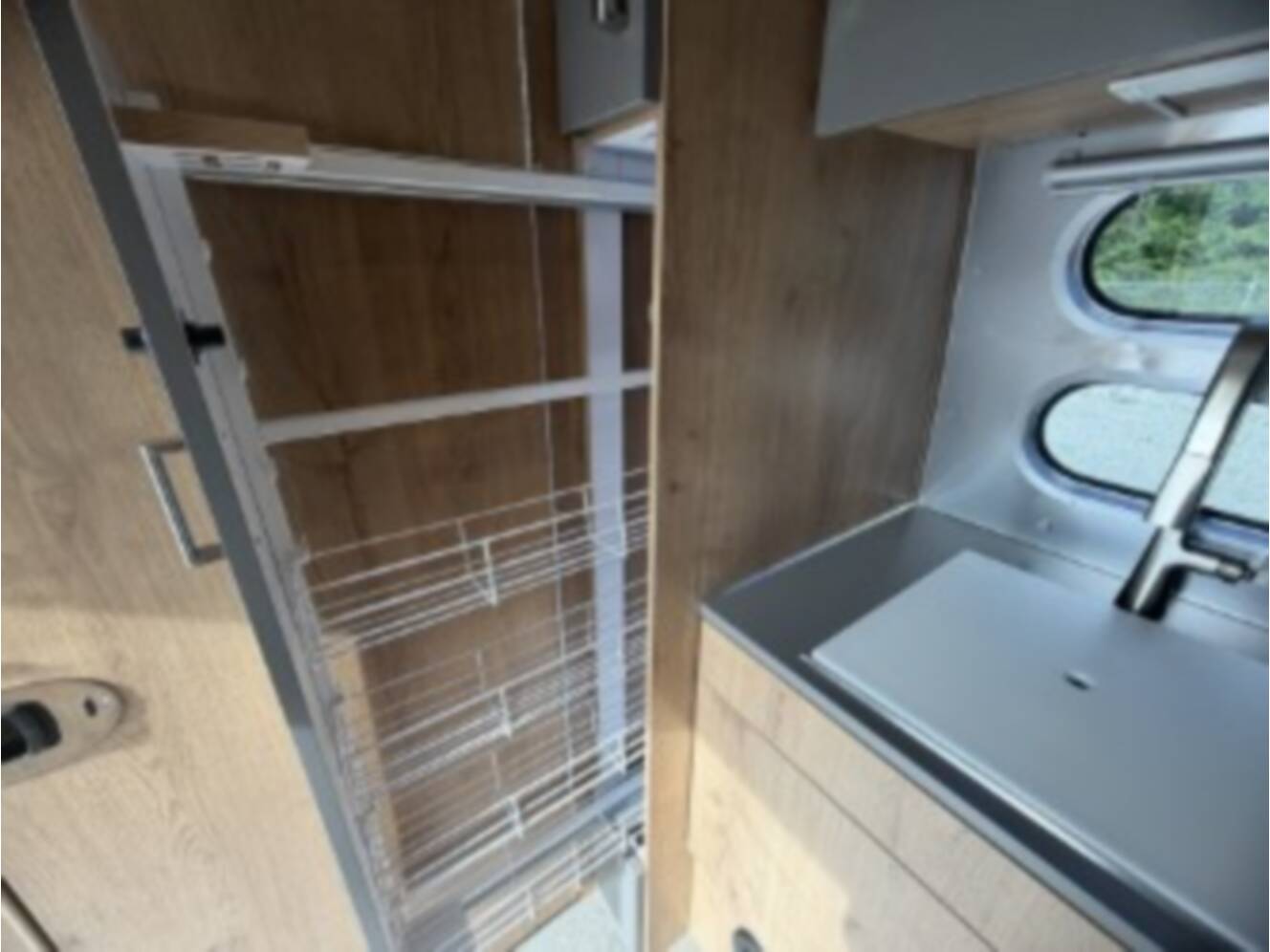 A photo of this 2026 Airstream Trade Wind 23FBT