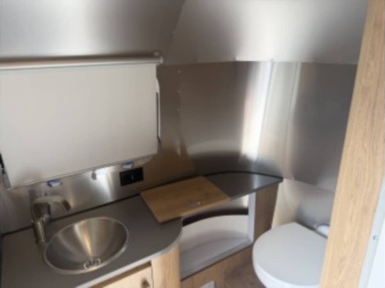 A photo of this 2026 Airstream Trade Wind 23FBT