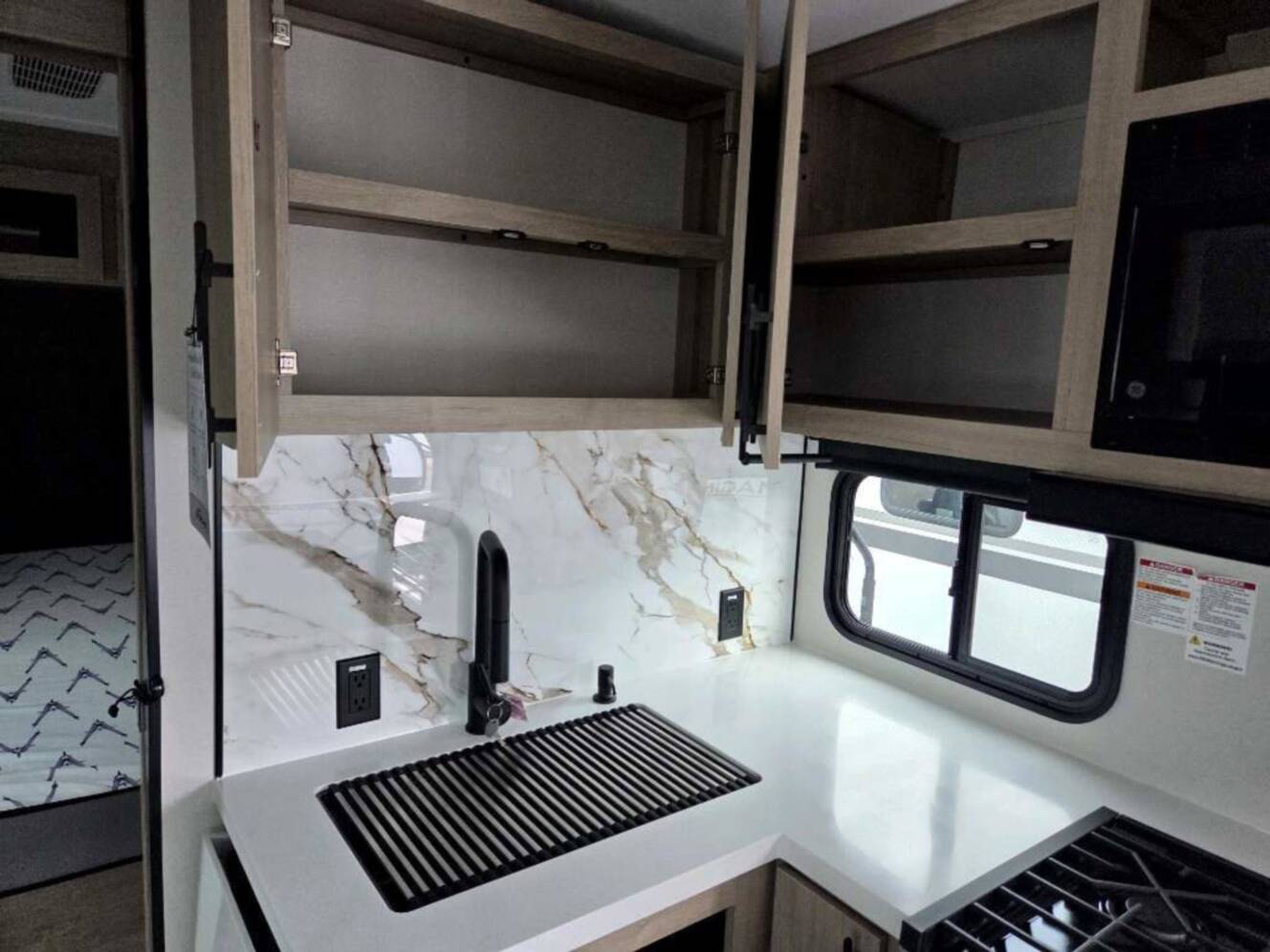 A photo of this 2026 Grand Design Imagine 2300MK