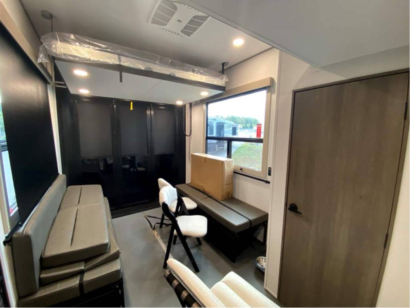 A photo of this 2026 Grand Design Momentum M-Class 414M