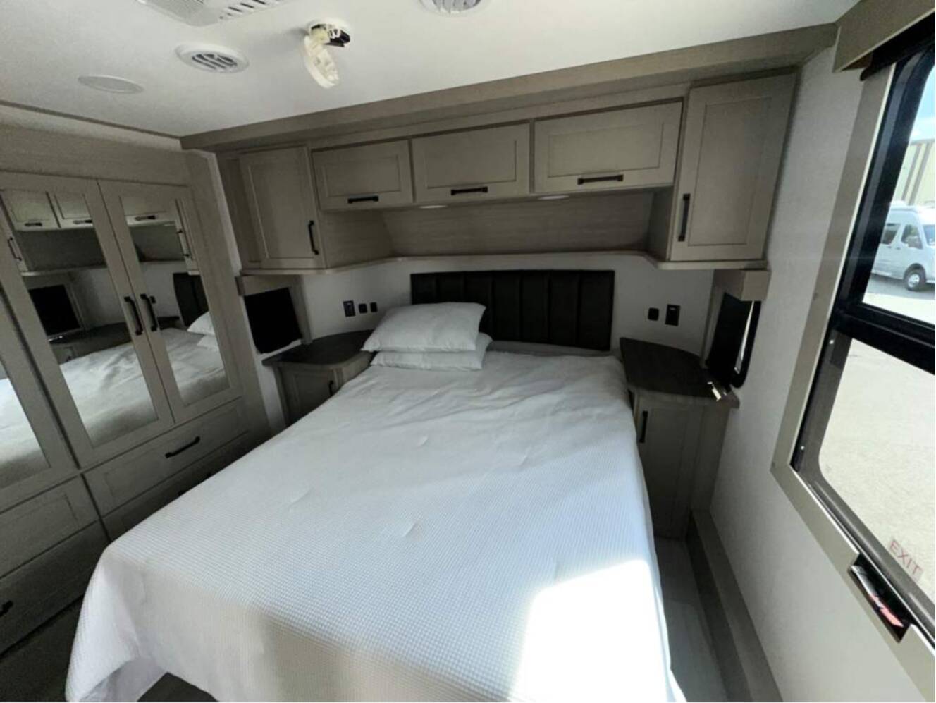 A photo of this 2026 Grand Design Momentum M-Class 392M