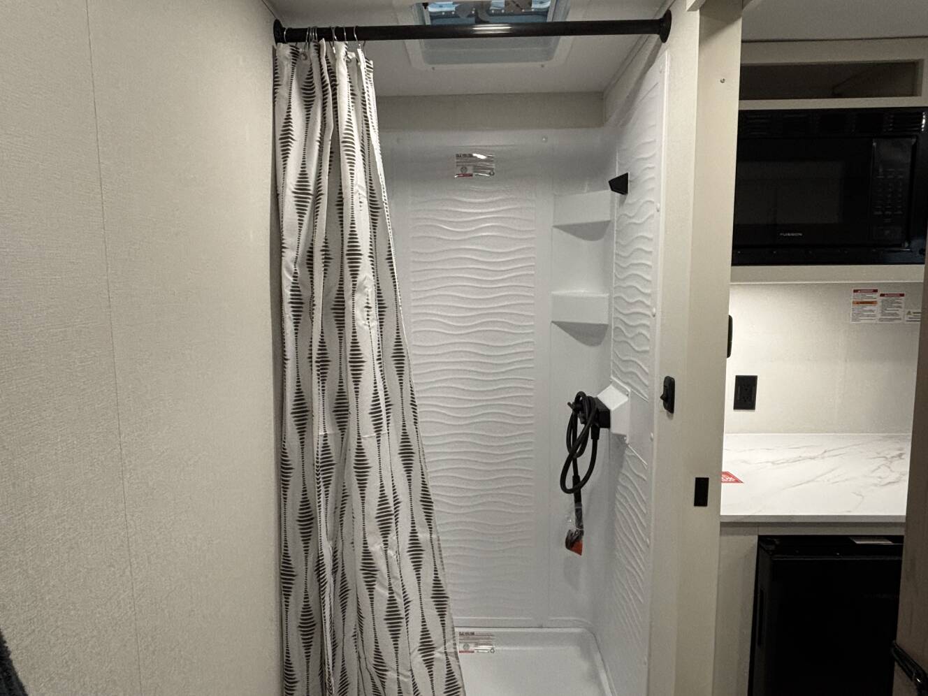 A photo of this 2026 Grand Design Transcend ONE 151RB