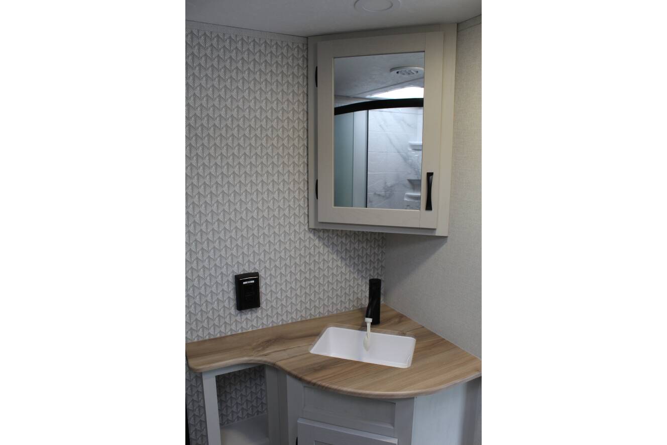 A photo of this 2027 Coachmen CHAPARRAL LITE 27BAR