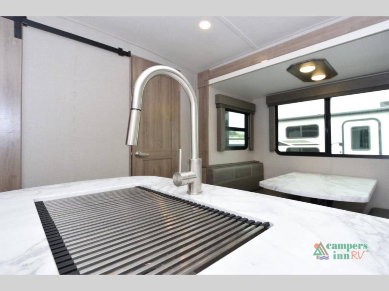 A photo of this 2022 Grand Design Imagine 3250BH