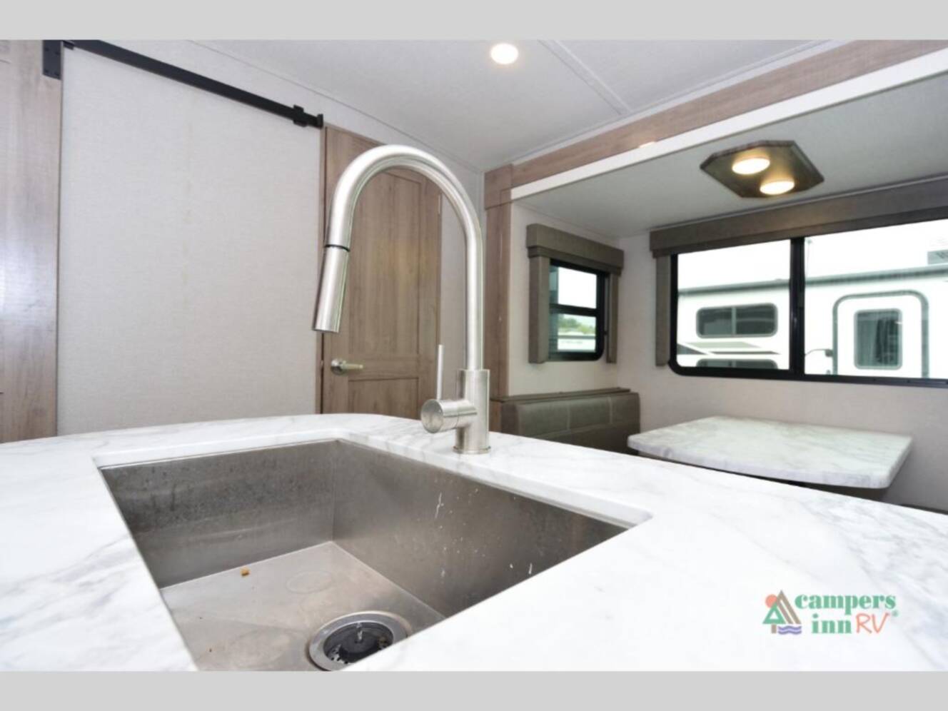 A photo of this 2022 Grand Design Imagine 3250BH
