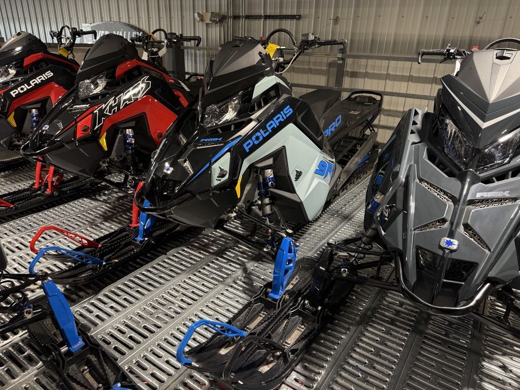2026 Polaris® Patriot 9R PRO RMK 155 Hemlock Blue / Black / Velocity  in red wing MN