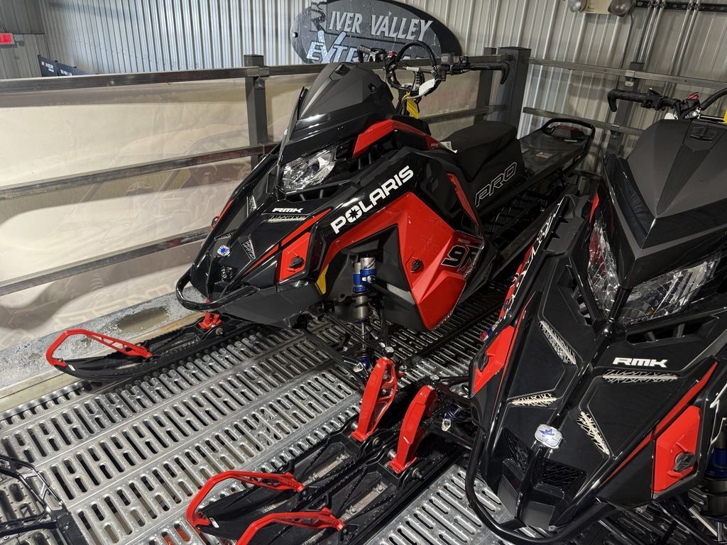 2026 Polaris® Patriot 9R PRO RMK 155 Gloss Black / Blue Dusk in red wing MN