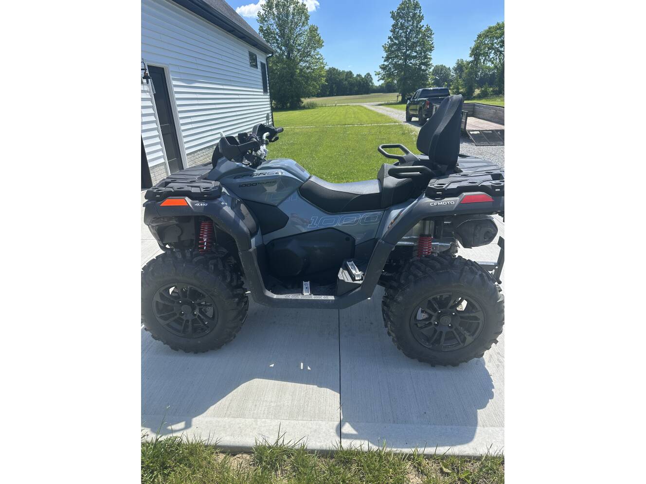 A photo of this 2025 CFMOTO CFORCE 1000 TOURING