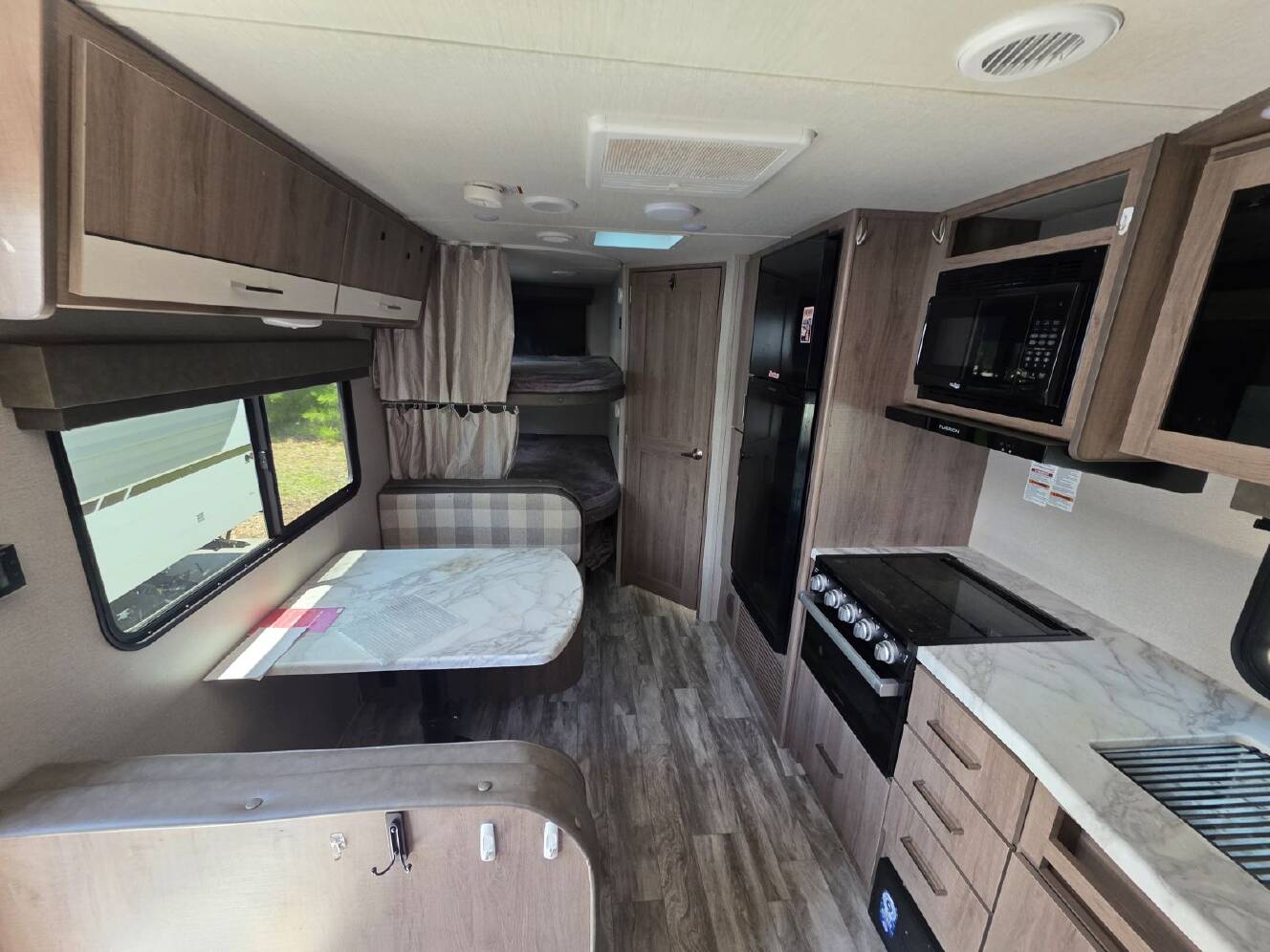A photo of this 2023 Grand Design Imagine 21BHE
