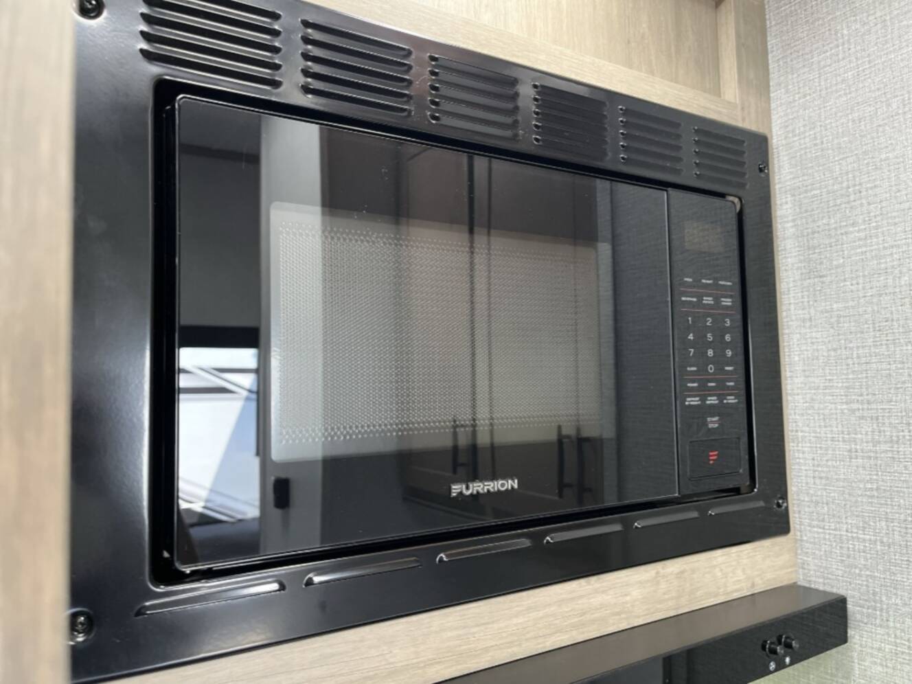 A photo of this 2023 Grand Design Momentum G-Class 350G