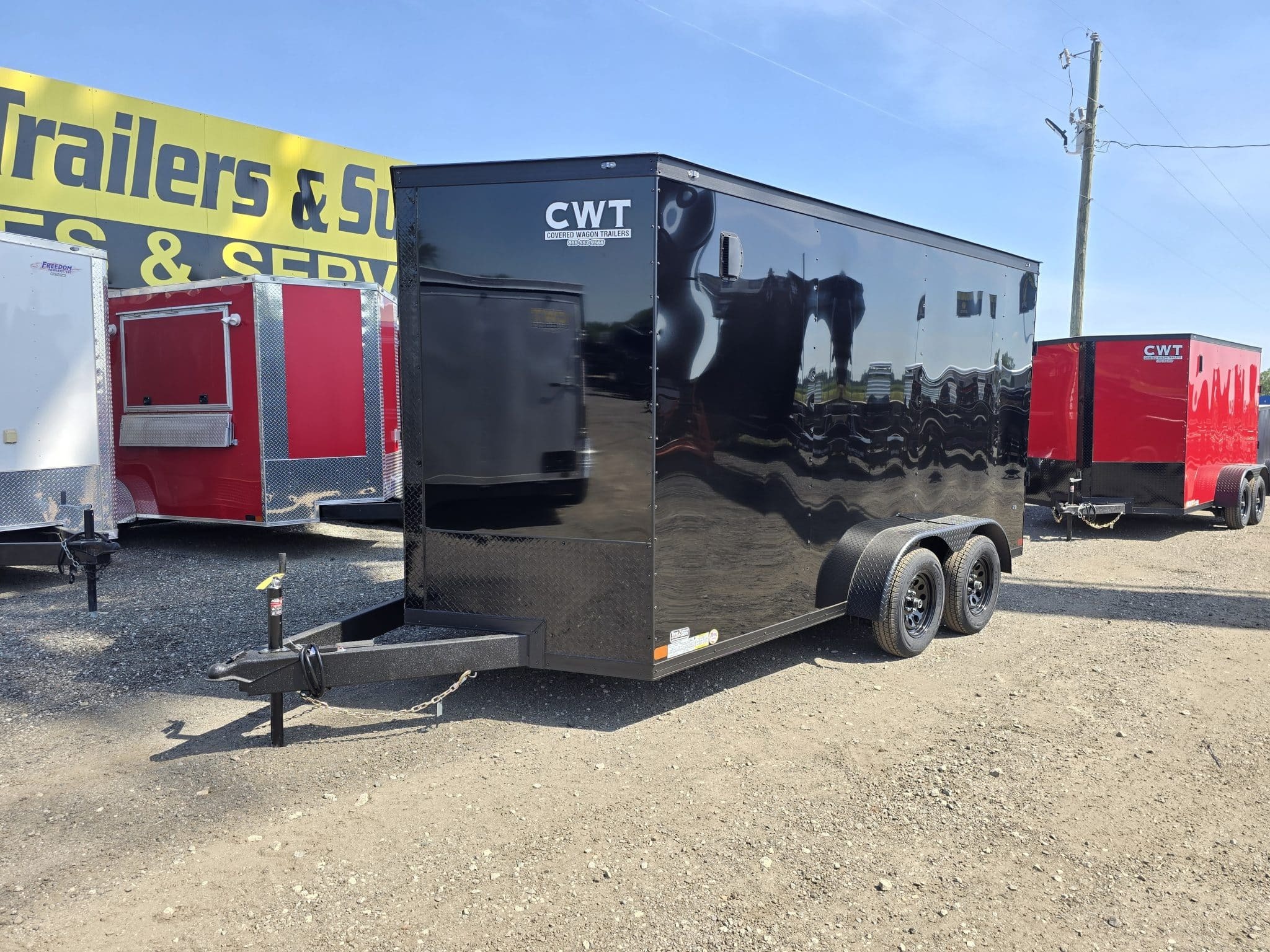 2026 coveredwagontrailers 7x14 TA black blackout enclosed motorcycle trailer in Byron, GA