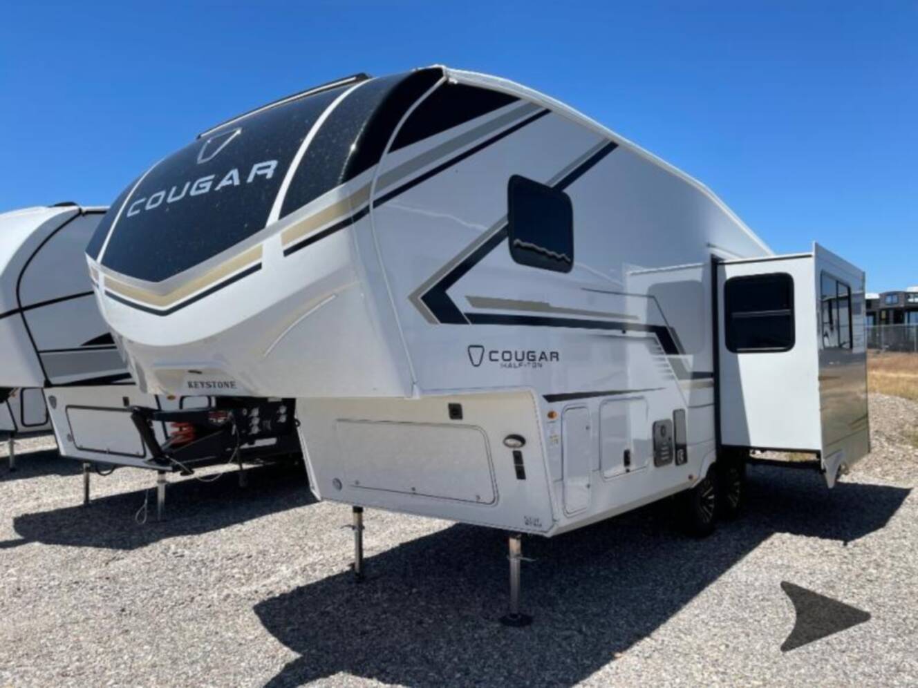 A photo of this 2026 Keystone Rv Cougar Half-Ton 23MLE