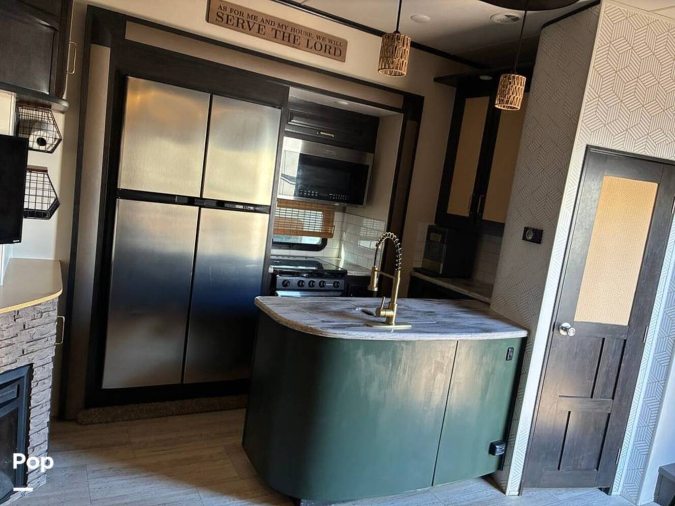 A photo of this 2015 Grand Design Momentum 388M
