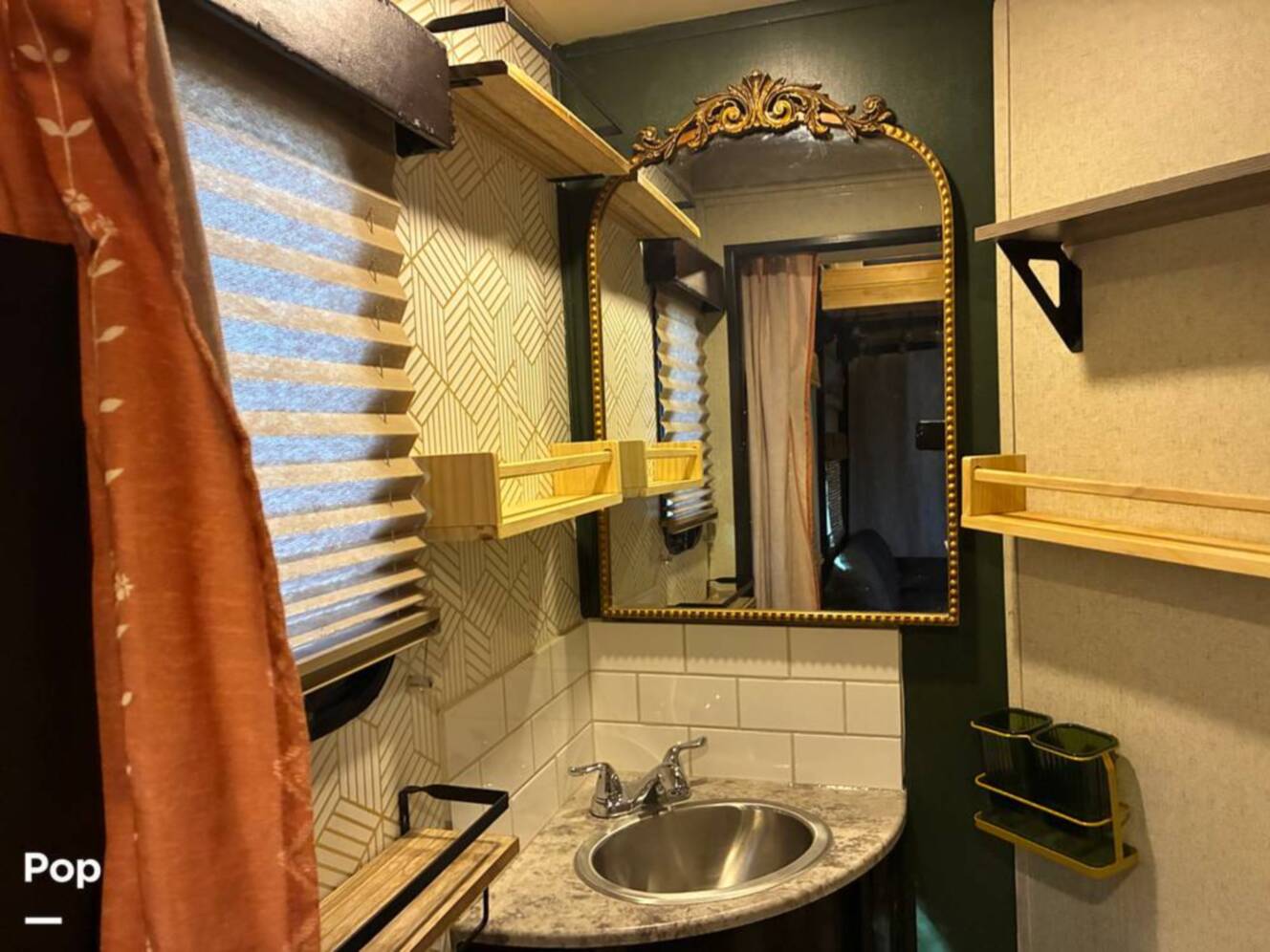 A photo of this 2015 Grand Design Momentum 388M