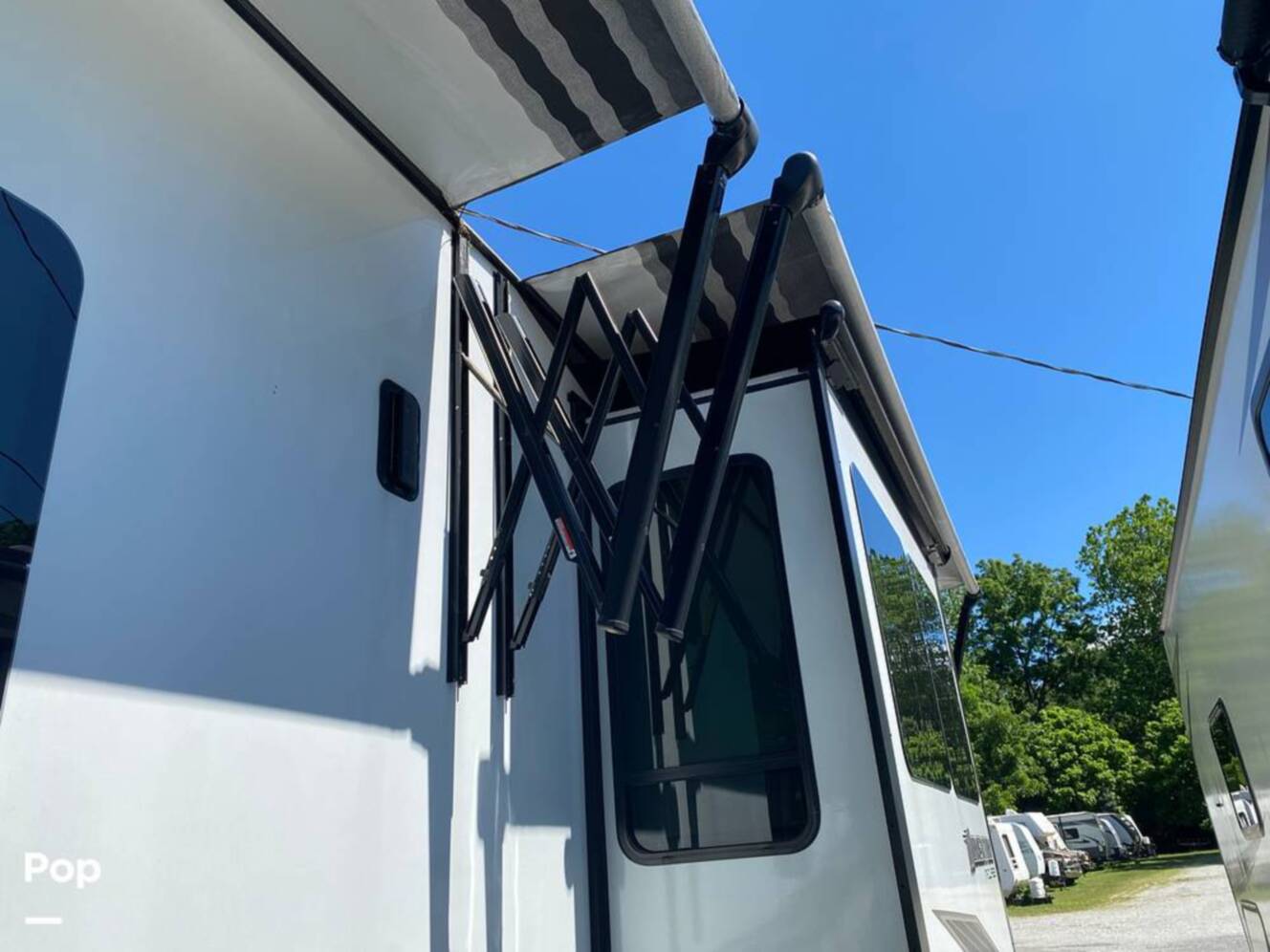 A photo of this 2022 Grand Design Momentum M-Class 398M
