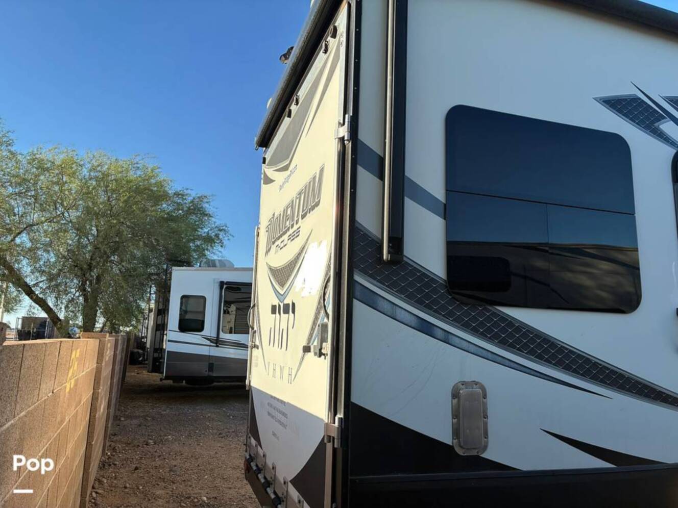 A photo of this 2015 Grand Design Momentum 388M