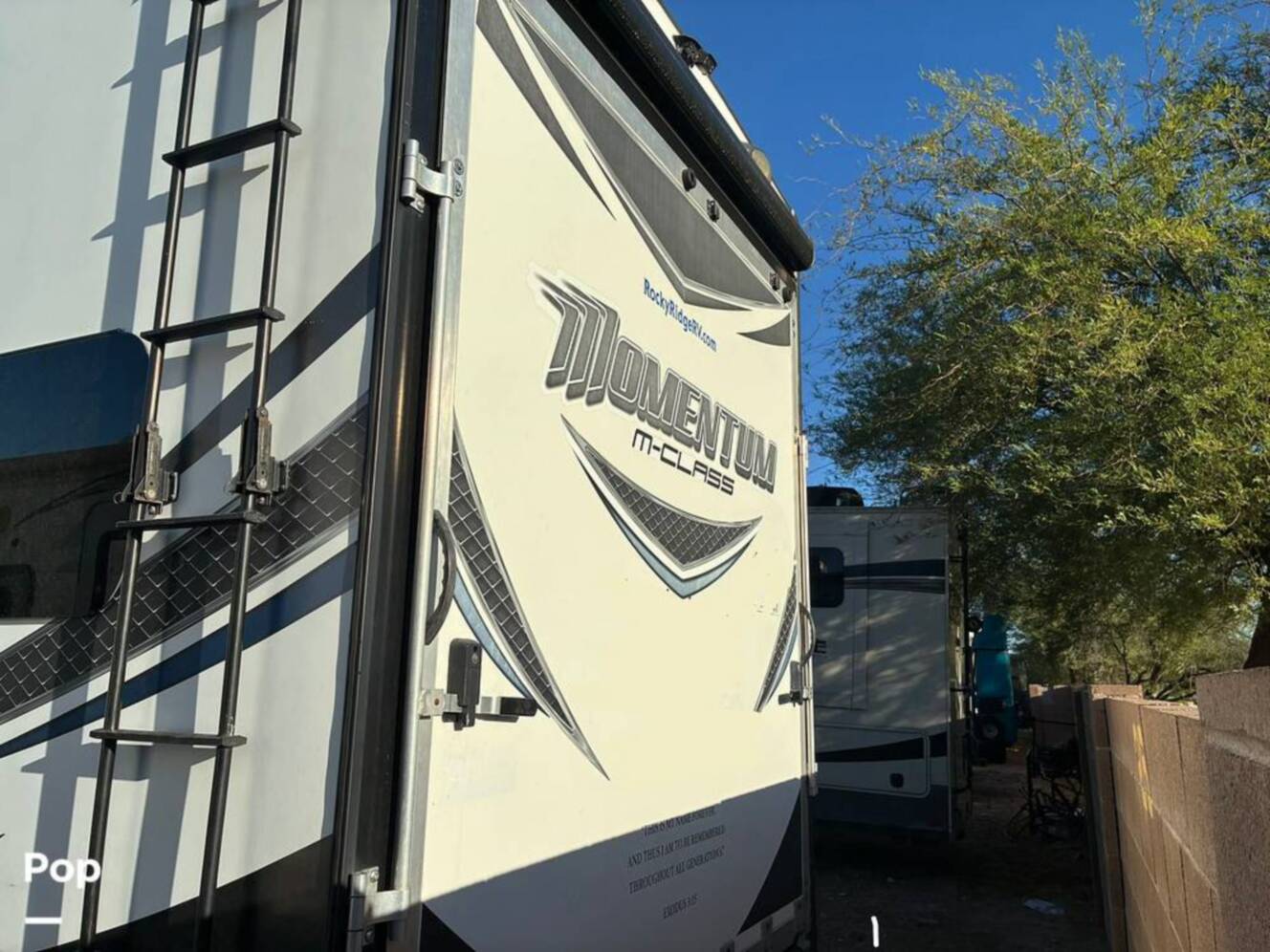 A photo of this 2015 Grand Design Momentum 388M