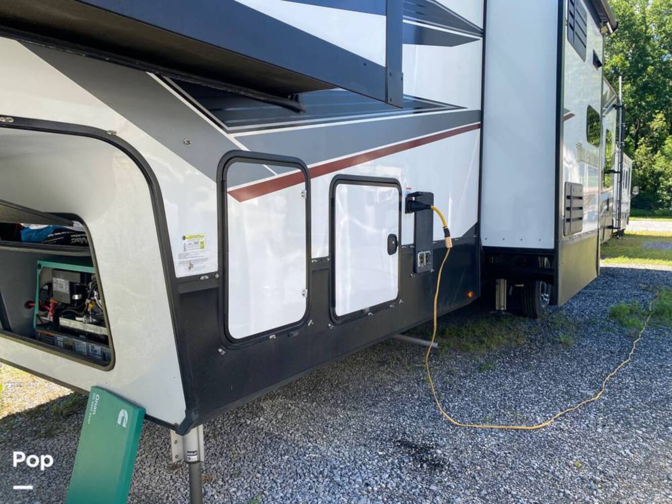 A photo of this 2022 Grand Design Momentum M-Class 398M
