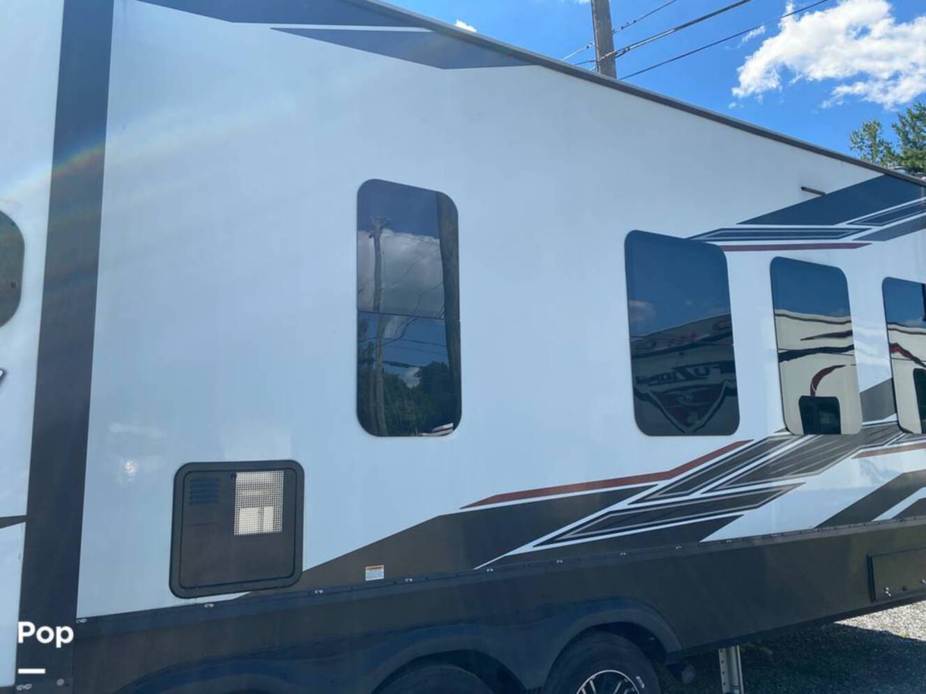 A photo of this 2022 Grand Design Momentum M-Class 398M