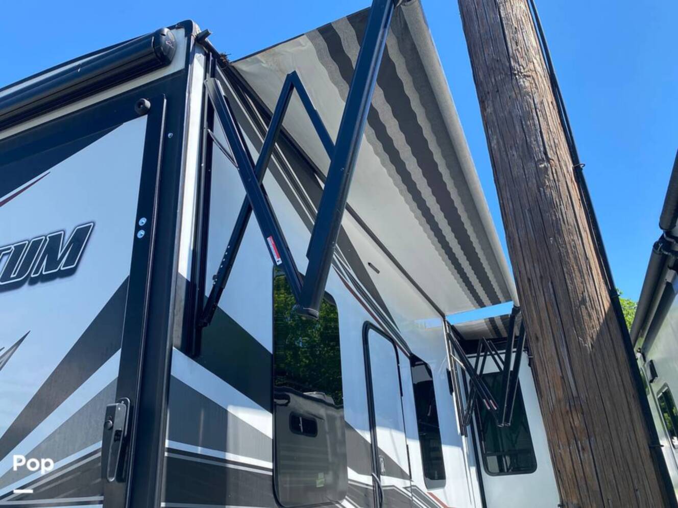A photo of this 2022 Grand Design Momentum M-Class 398M
