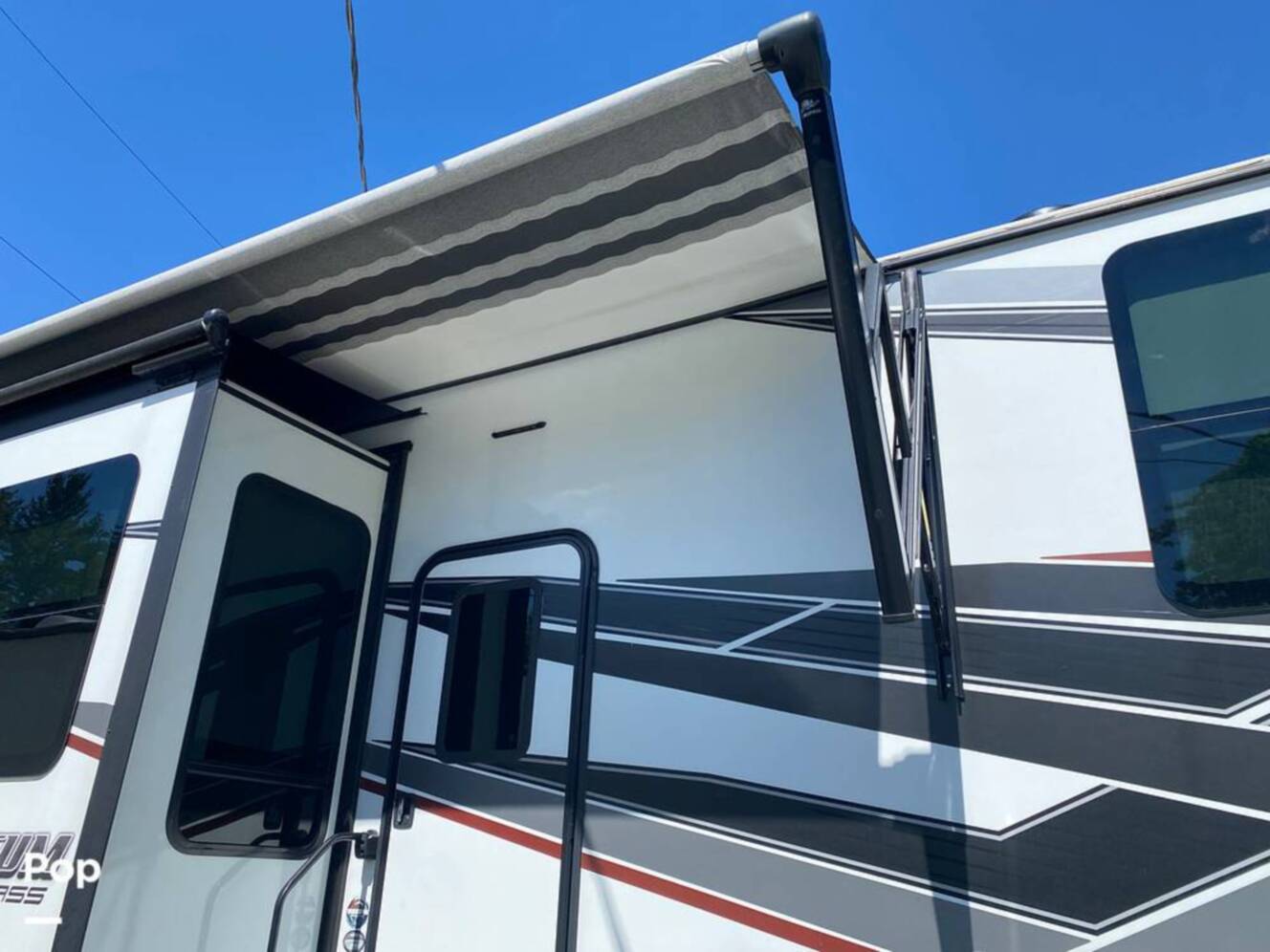 A photo of this 2022 Grand Design Momentum M-Class 398M