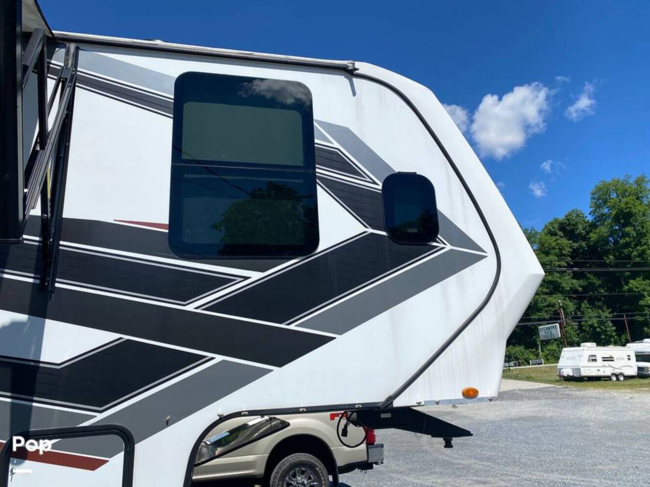 A photo of this 2022 Grand Design Momentum M-Class 398M