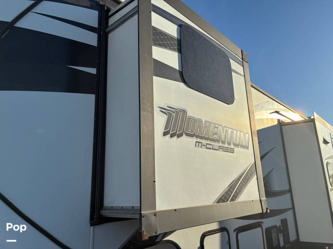 A photo of this 2015 Grand Design Momentum 388M