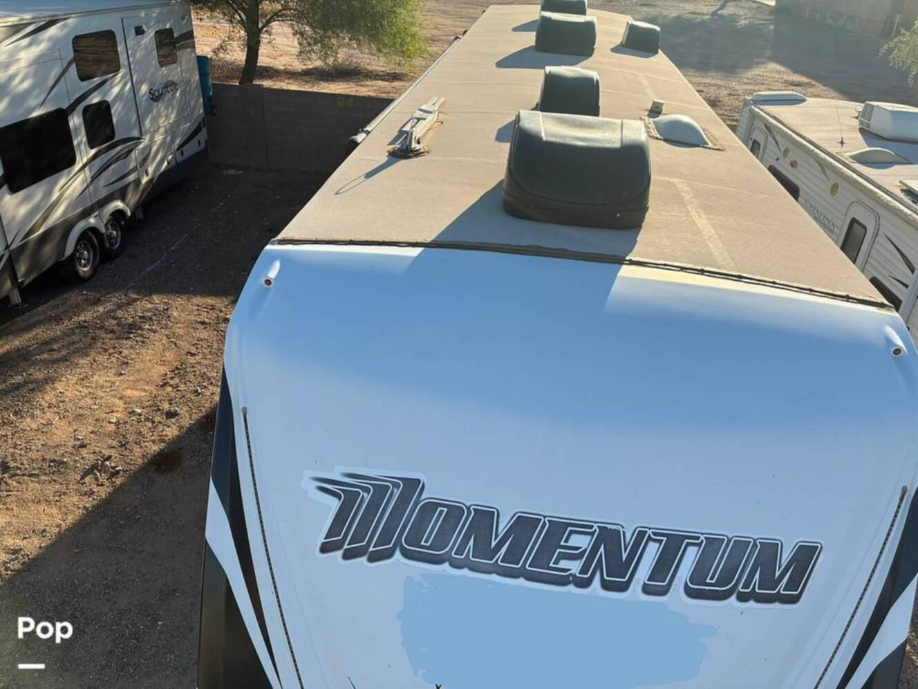 A photo of this 2015 Grand Design Momentum 388M
