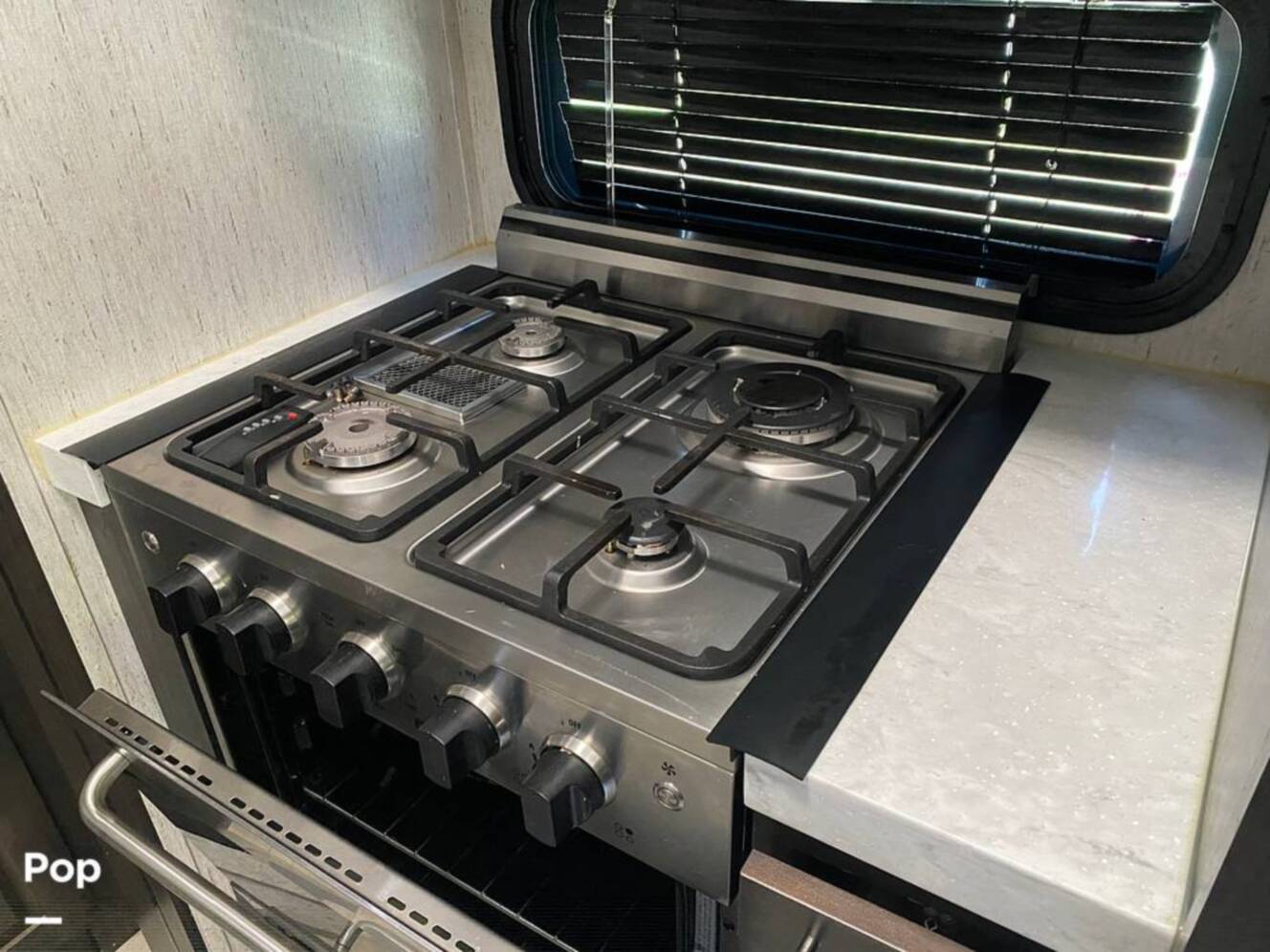 A photo of this 2022 Grand Design Momentum M-Class 398M