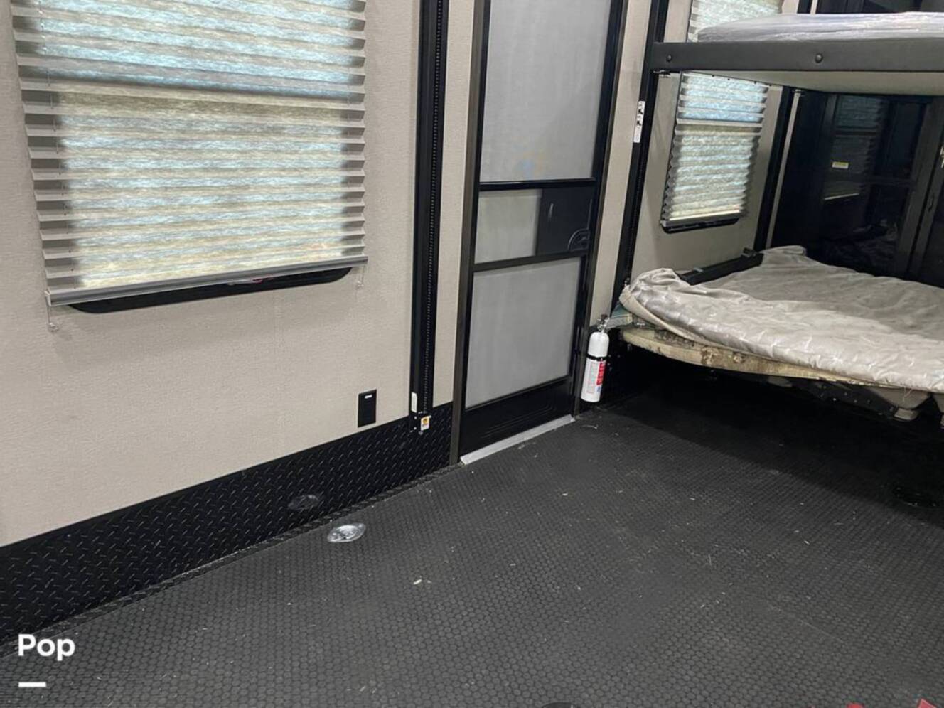 A photo of this 2022 Grand Design Momentum M-Class 398M