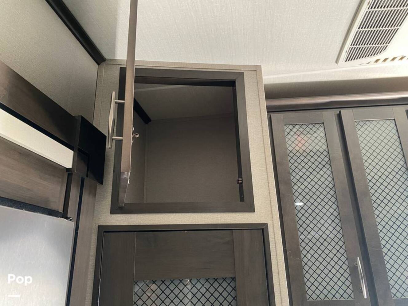 A photo of this 2022 Grand Design Momentum M-Class 398M