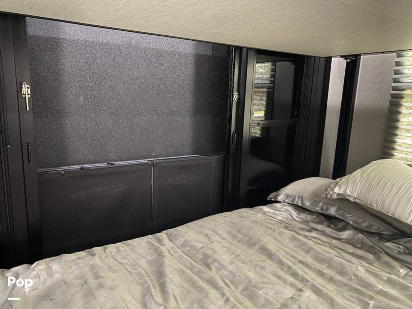 A photo of this 2022 Grand Design Momentum M-Class 398M