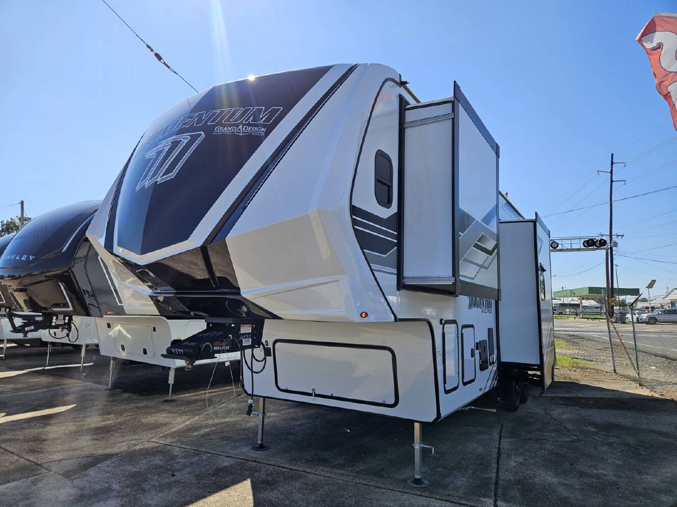 A photo of this 2026 Grand Design Momentum G-Class 320G
