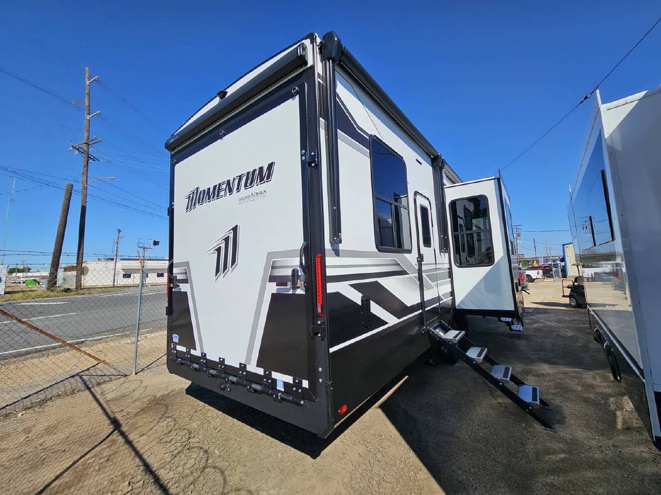 A photo of this 2026 Grand Design Momentum G-Class 320G