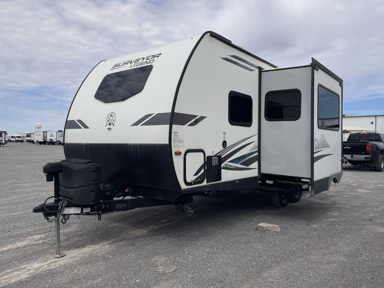 A photo of this 2022 Forest River SURVEYOR 203RKLE