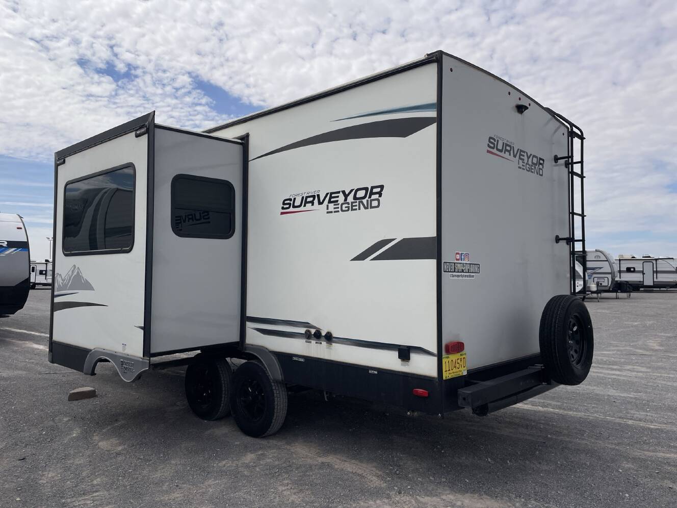 A photo of this 2022 Forest River SURVEYOR 203RKLE