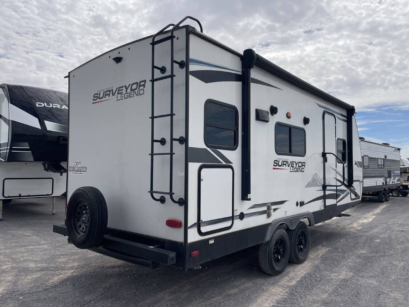 A photo of this 2022 Forest River SURVEYOR 203RKLE