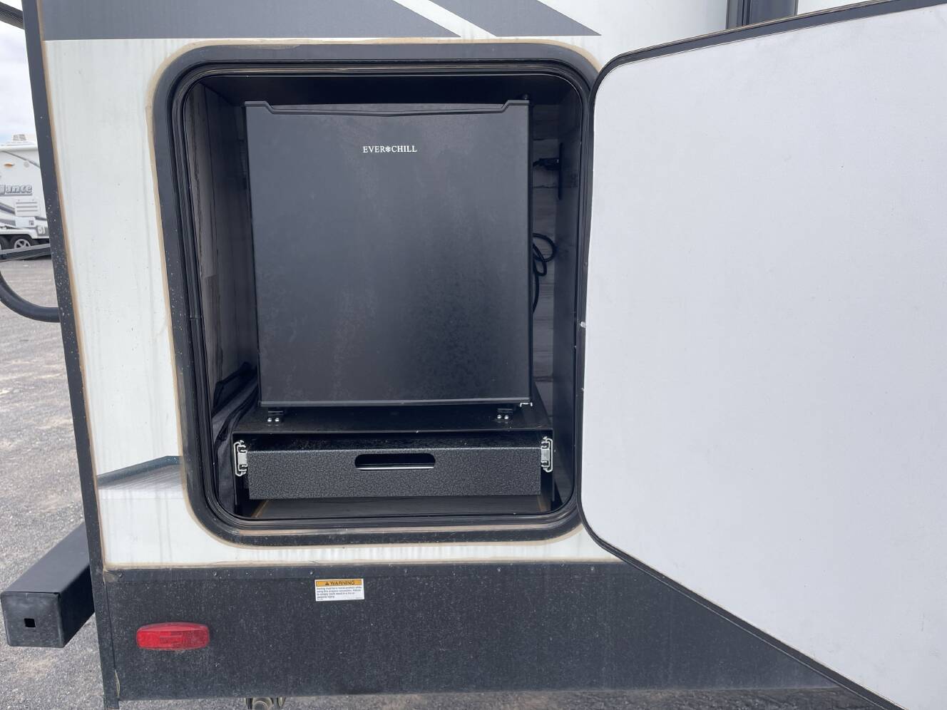 A photo of this 2022 Forest River SURVEYOR 203RKLE