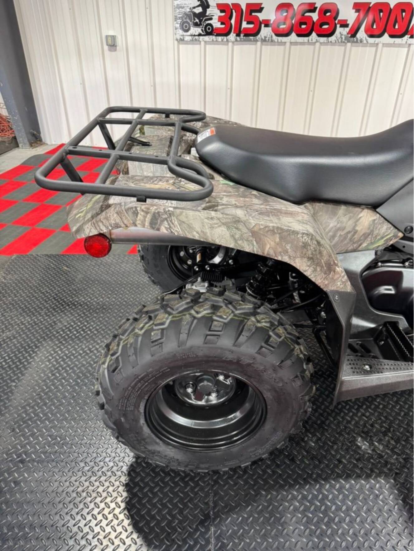 A photo of this 2025 Suzuki KingQuad 400ASi Camo